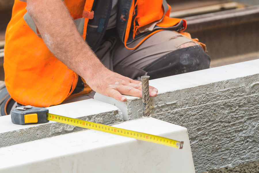 construction worker doing foundation repair