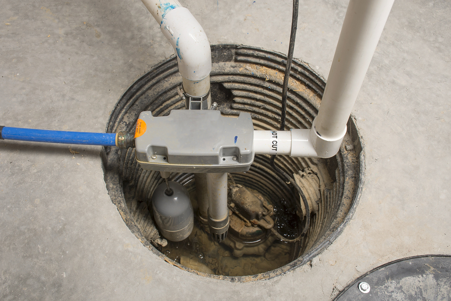 sump pump installation in process